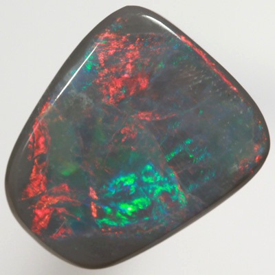 SOLID BLACK OPAL Bright rolling flashes of red to green SEE VIDEOS